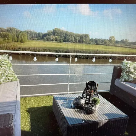 Met Scheldezicht Daire *